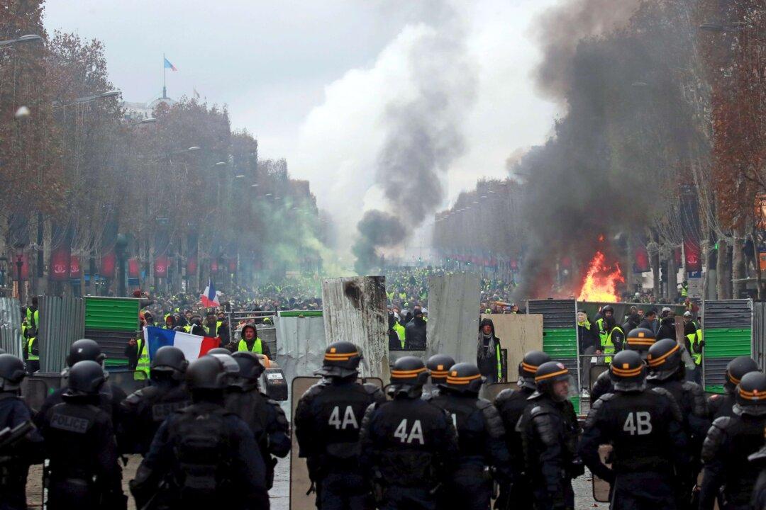 French Police Clash With Violent Protesters in Central Paris Over Fuel Costs
