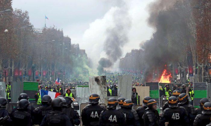 French Police Clash With Violent Protesters in Central Paris Over Fuel Costs