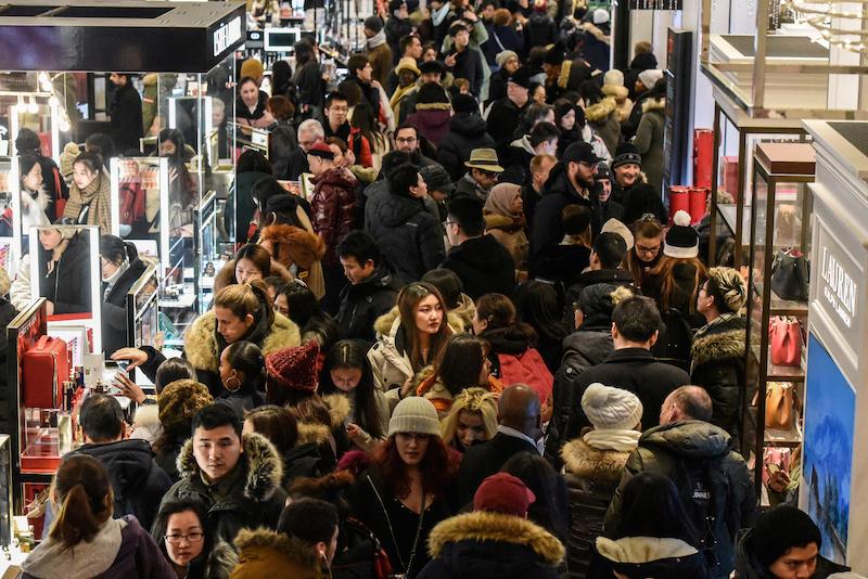 A large crowd of people shop during a Black Friday sales event at Macy's flagship store on 34th St. in New York City, on Nov. 22, 2018. (Stephanie Keith/Reuters)