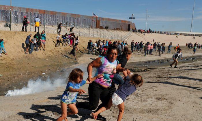 Navy SEAL Challenges Iconic Image of Teargassed Migrants at Mexico Border