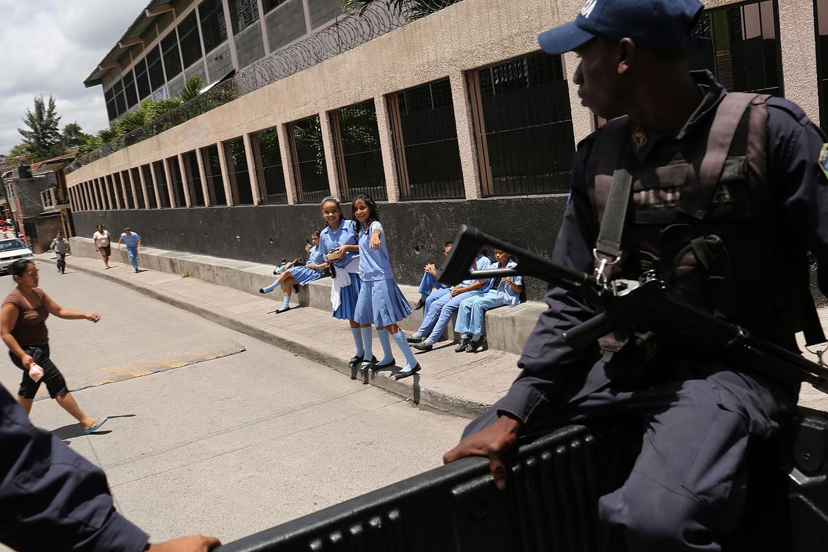 Police patrol the streets of a gang ridden neighborhood on July 20, 2012 in Tegucigalpa, Honduras. (Spencer Platt/Getty Images)