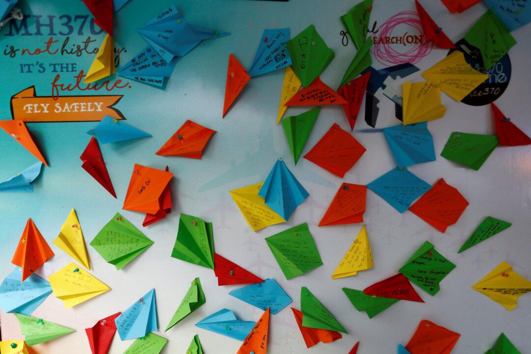 Relatives of Missing From Malaysia Plane Say They Have Found Pieces of Debris