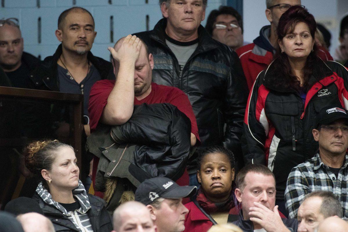A union member reacts as union leaders speak at Local 222. (Lars Hagberg/AFP/Getty Images)