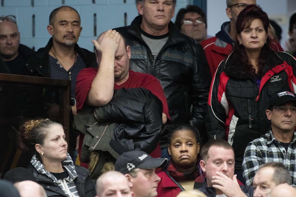 A union member reacts as union leaders speak at Local 222 in Oshawa, Ontario, on November 26, 2018. (LARS HAGBERG/AFP/Getty Images)