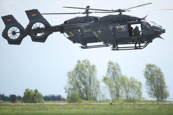 Two Airbus H145M LUH helicopters of the Bundeswehr, the German armed forces, participate at the ILA Berlin Air Show in Schoenefeld, Germany on April 26, 2018. (Sean Gallup/Getty Images)