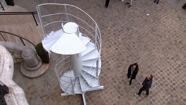 The original staircase of the Eiffel Tower constructed by Gustave Eiffel in 1889 is displayed during a press preview ahead of its upcoming auction organized by Artcurial in Paris, France, on Nov. 8, 2018. (Screenshot/Reuters)