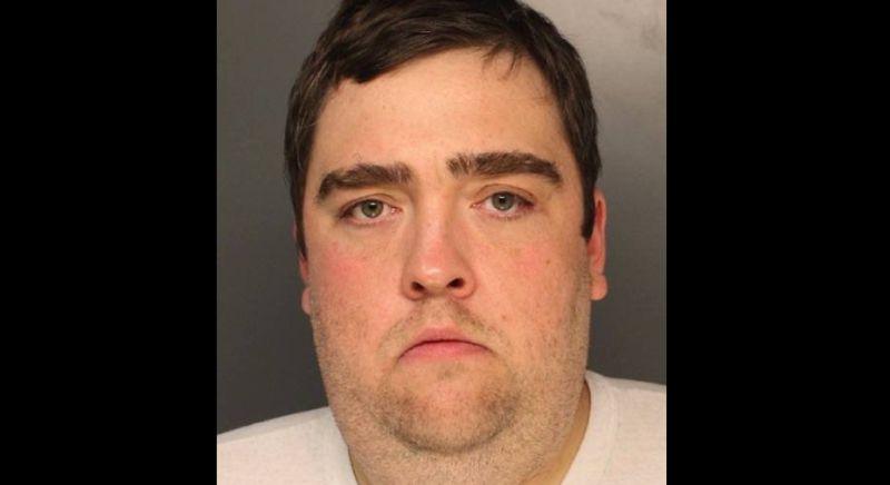 Tom Keenan, 33, of Mount Airy, turned himself into police several days ago after investigators released a video that appeared to show him and two others yelling at a group. (Philadelphia Police)