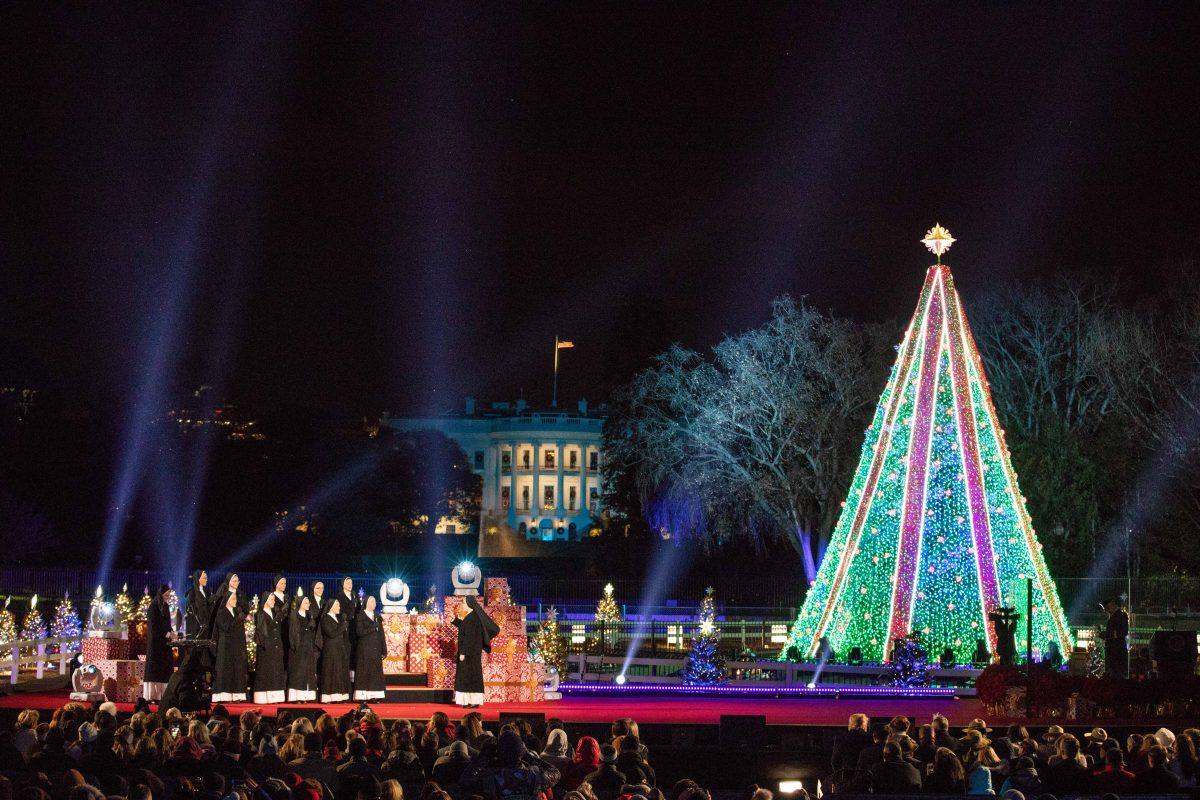 The Dominican Sisters of Mary perform at the lighting of the National Christmas Tree in Washington on Nov. 28, 2018. (Samira Bouaou/The Epoch Times)