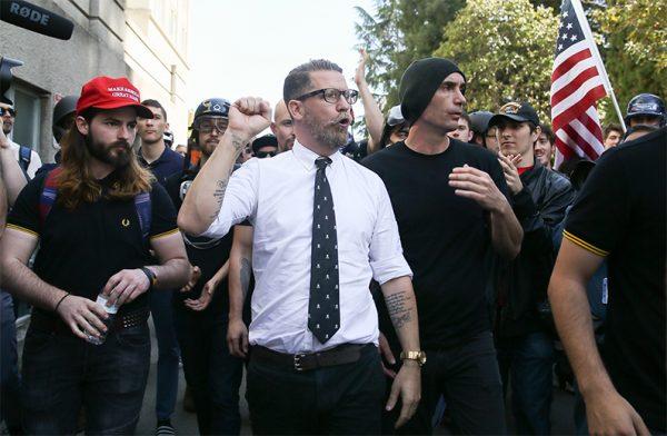Right wing provocateur and Vice co-founder Gavin McInnes (C) pumps his fist during a rally at Martin Luther King Jr. Civic Center Park in Berkeley, California on April 27, 2017. (Elijah Nouvelage/Getty Images)