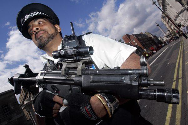 An armed response police officer stands guard on Whitehall, London, in a file photo. (Leon Neal/AFP/Getty Images)