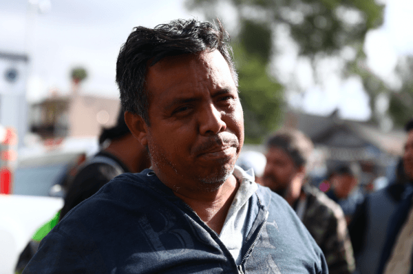 Pueblo Sin Fronteras Director Irineo Mujica talks to reporters outside the near-empty migrant camp at the Benito Juarez sports complex near the U.S. border in Tijuana, Mexico, on Dec. 1, 2018. (Charlotte Cuthbertson/The Epoch Times)