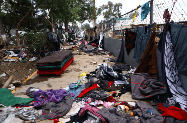 The remnants of the migrant caravan are left at the Benito Juarez sports complex near the U.S. border after almost all of them were relocated to an event space about 10 miles from the border in Tijuana, Mexico, on Dec. 1, 2018. (Charlotte Cuthbertson/The Epoch Times)