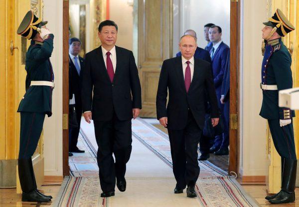 Russian President Vladimir Putin and Chinese leader Xi Jinping at the Kremlin in Moscow on July 4, 2017. (Mikhail Klimentiev/AFP/Getty Images)