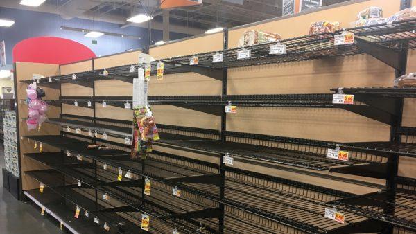 Empty shelves where bread is normally located are shown at a grocery store in Anchorage, Alaska, on Dec. 2, 2018. (Mark Thiessen/AP)