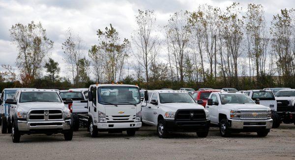 Chassis Cab trucks sit in a lot waiting to be upfitted for commercial use in Flint, Michigan, on Oct. 17, 2018. (Rebecca Cook/Reuters)