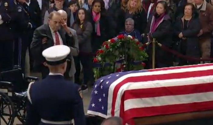 Bob Dole, 95, Is Helped out of Wheelchair to Salute Casket of George HW Bush