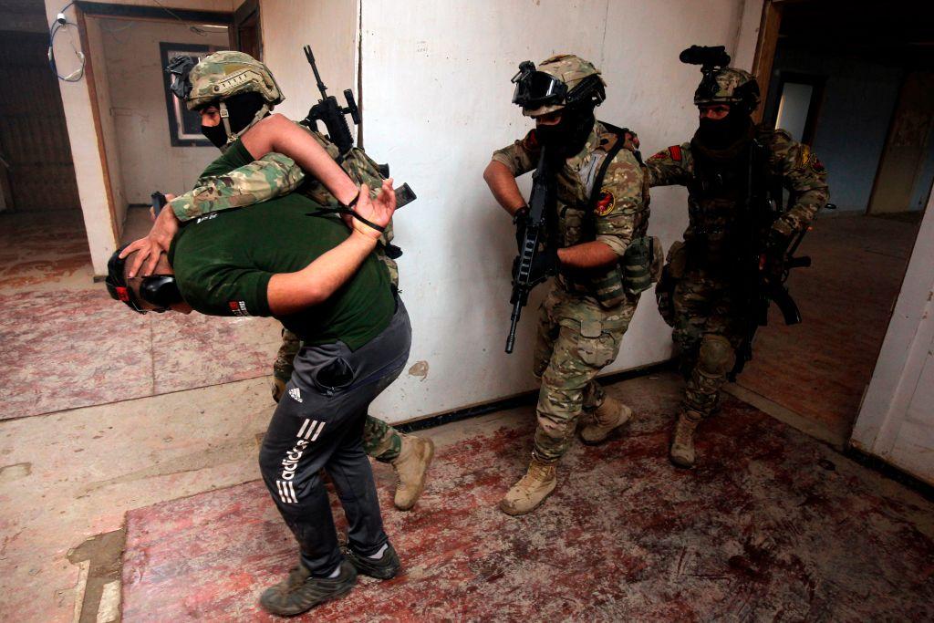Members of Iraq's Rapid Response military unit take part in a "counter-terrorism" training at a military base inside Baghdad International Airport on Dec. 4, 2018. (Ahmad Al-Rubaye/AFP/Getty Images)