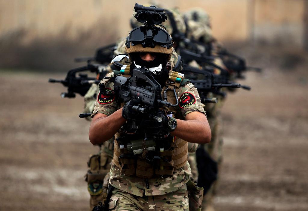 Members of Iraq's Rapid Response military unit take part in a "counter-terrorism" training at a military base inside Baghdad International Airport on Dec. 4, 2018. The exercises are being held over a period of four months in cooperation with the Italian forces in Iraq. (Ahmad Al-Rubaye/AFP/Getty Images)