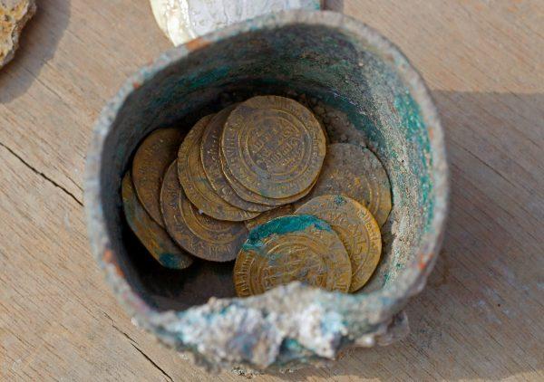 Ancient gold coins recently uncovered at an excavation site in the Israeli Mediterranean town of Caesarea, on Dec. 3, 2018. (Jack Guez/AFP/Getty Images)