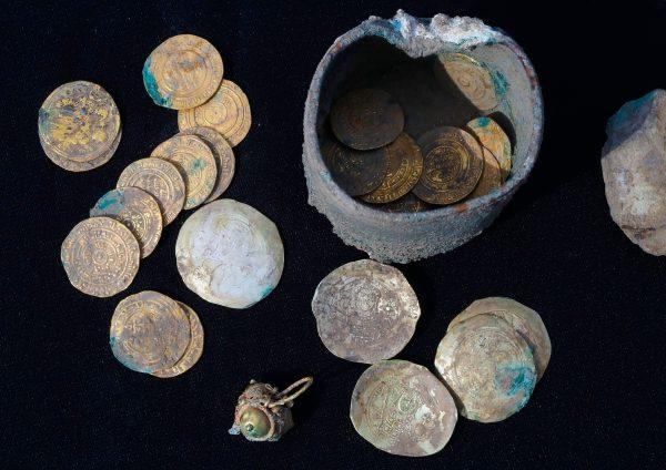 Recently-uncovered gold coins dating back to the Muslim Fatimid (AD 909-1171) and Byzantine eras (AD 1071-1078) on Dec. 3, 2018. (Jack Guez/AFP/Getty Images)
