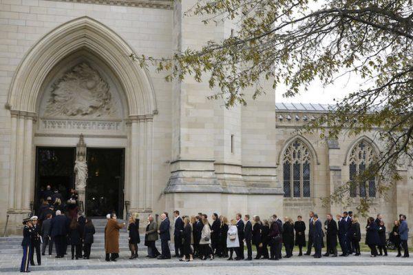 Mourners file into the Washington National Cathedral before the State Funeral for former President George H.W. Bush in Washington on Dec. 5, 2018. (AP Photo/Patrick Semansky)