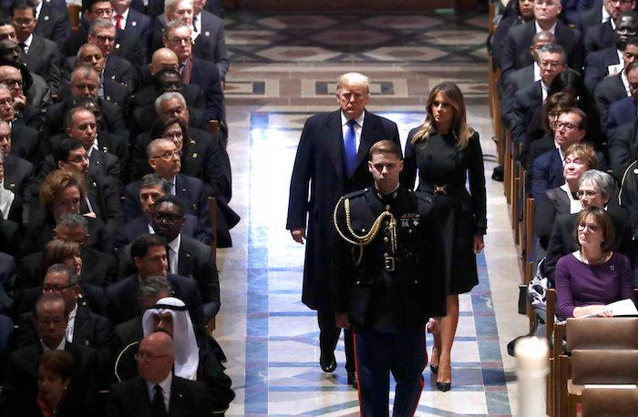 President Donald Trump and First Lady Melania Trump arrive for the state funeral former President George H.W. Bush, at the National Cathedral in Washington, on Dec. 5, 2018. (Evan Vucci/AP Photo)