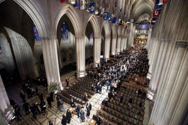 People arrive for a State Funeral for former President George H.W. Bush at the National Cathedral in Washington on Dec. 5, 2018. (AP Photo/Andrew Harnik, Pool)