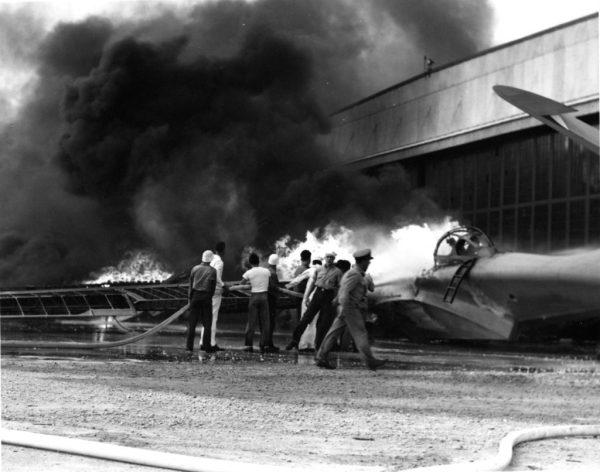 A patrol bomber burns at a military installation on Oahu's Kaneohe Bay during the Japanese attack on Pearl Harbor in Hawaii on Dec. 7, 1941. (U.S. Navy via AP, File)