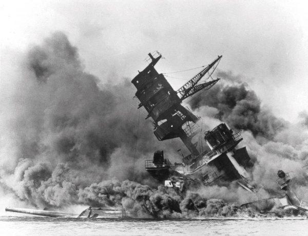 Smoke rises from the battleship USS Arizona as it sinks during the Japanese attack on Pearl Harbor, Hawaii, on Dec. 7, 1941. (AP Photo, File)