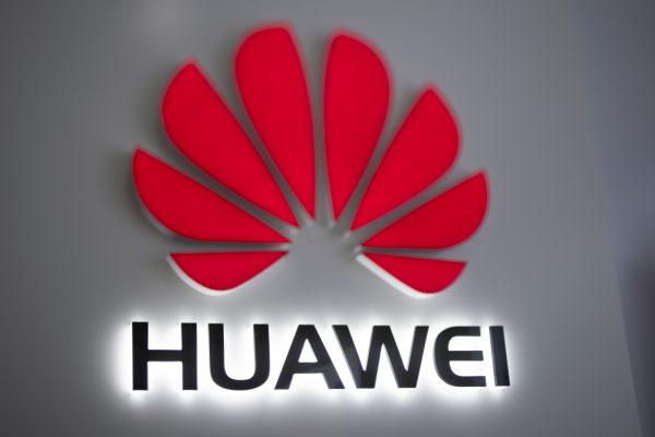 The Huawei logo is displayed at a store in Beijing on December 6, 2018. (Fred Dufour/AFP/Getty Images)