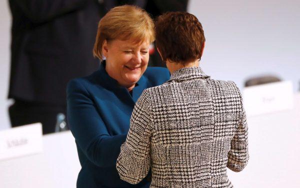 Annegret Kramp-Karrenbauer is congratulated by German Chancellor Angela Merkel after being elected as the party leader during the Christian Democratic Union party congress in Hamburg, Germany, on Dec. 7, 2018. (Reuters/Fabrizio Bensch)