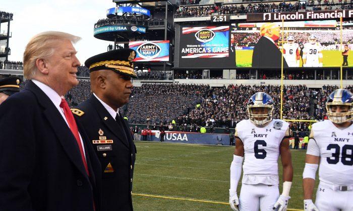 Videos of the Day: President Donald Trump Handles Coin Toss Before Army-Navy Game