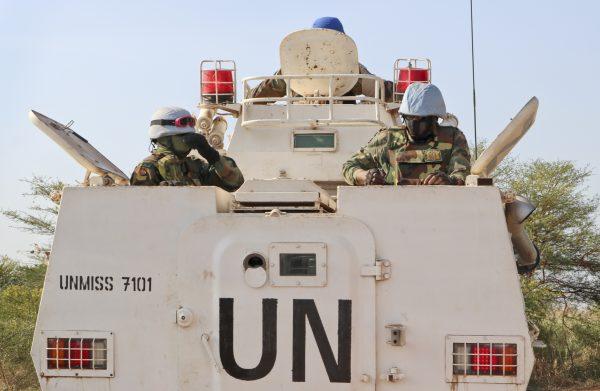 UN peacekeepers in an armored personnel carrier lead a patrol from Bentiu towards the village of Nhialdiu, on Dec. 7, 2018. (Sam Mednick/AP)