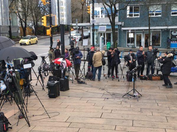 Reporters gather outside Huawei CFO Meng Wanzhou's bail hearing at the British Columbia Supreme Court in Vancouver on Dec. 10, 2018. (Yutong/The Epoch Times)