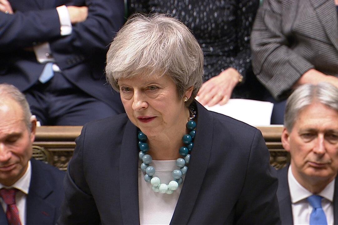 Brexit in Turmoil as UK PM May Pulls Vote on Her Divorce Deal