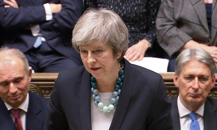 Brexit in Turmoil as UK PM May Pulls Vote on Her Divorce Deal