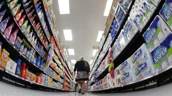 A shopper walks down an aisle in a newly opened Walmart Neighborhood Market in Chicago in this September 21, 2011. (Jim Young/Files/Reuters)