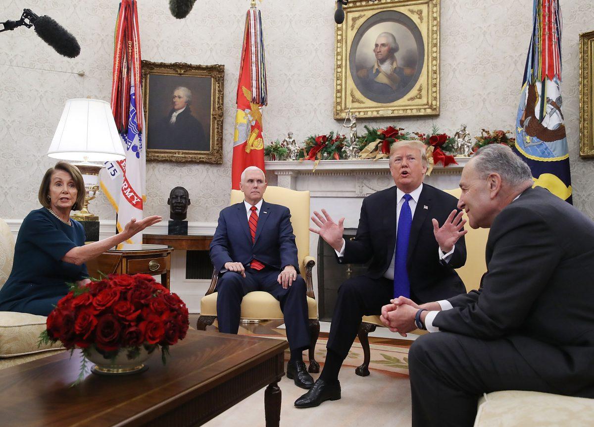 Vice President Mike Pence (second from left) listens while presumptive Speaker, House Minority Leader Nancy Pelosi (D-CA) (L), US President Donald Trump, and Senate Minority Leader Charles Schumer (D-NY) argue before a meeting at the White House in Washington on Dec. 11, 2018. (Brendan Smialowski/AFP/Getty Images)