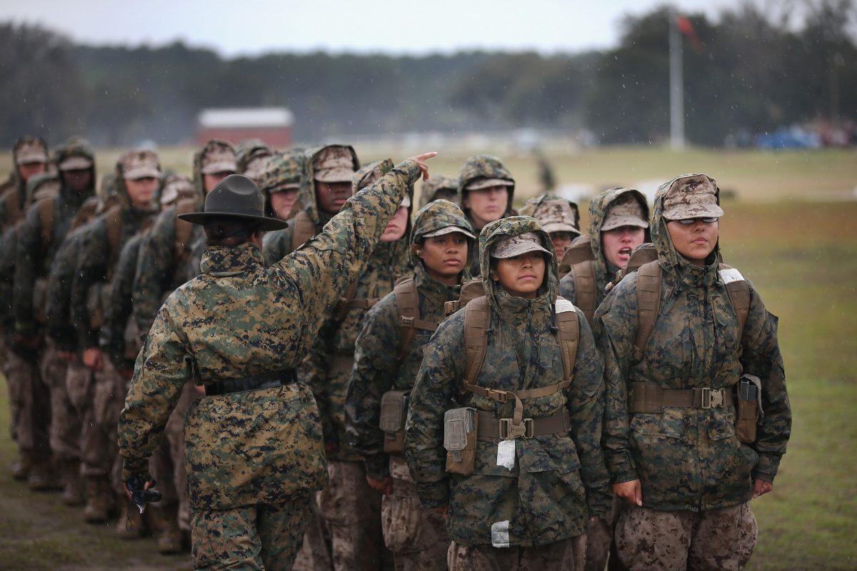 Marine recruits prepare to fire on the rifle range during boot camp at Marine Corps Recruit Depot Parris Island, South Carolina, on Feb. 25, 2013. (Scott Olson/Getty Images))
