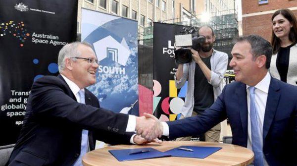 Australia's Prime Minister, Scott Morrison (L), shakes hands with South Australia's Premier, Steven Marshall, after signing a memorandum of understanding for a new space agency at the site of the former Royal Adelaide Hospital in Adelaide, South Australia, on Dec 12., 2018. (Prime Minister of Australia)