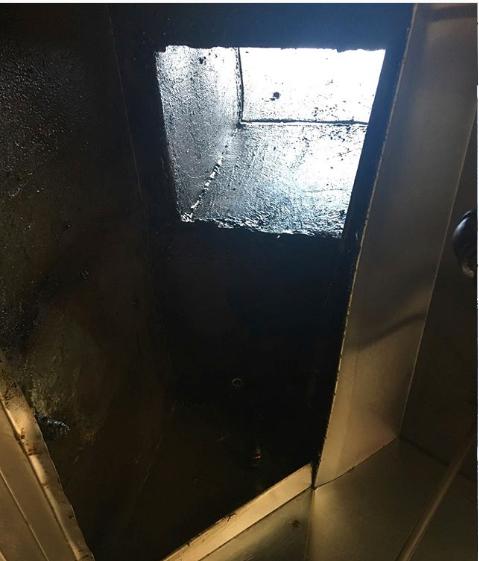 The grease duct of a vacant Chinese restaurant in California, pictured after firefighters freed the man who was trapped on Dec. 12, 2018. (Alameda County Sheriff)