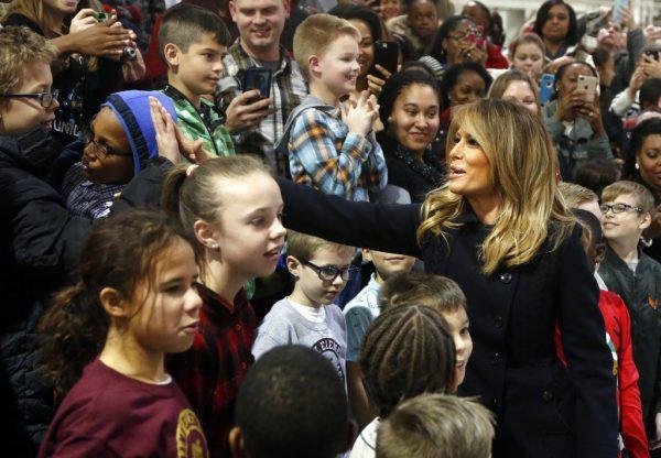 First lady Melania Trump greets children from the Burbank and Bethel Manor Elementary schools during a tour of Joint Base Langley in Hampton, Va., Wednesday, Dec. 12, 2018. (Steve Helber/AP)