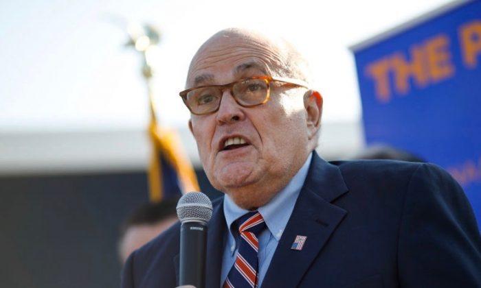 Giuliani Says Timing of Clients’ Arrests on Campaign Finance Charges Is Suspect