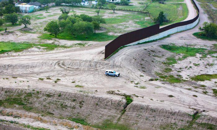 A portion of the border wall just north of the Rio Grande, which separates the U.S. and Mexico, in Brownsville, Texas, on May 30, 2017. (Benjamin Chasteen/The Epoch Times)