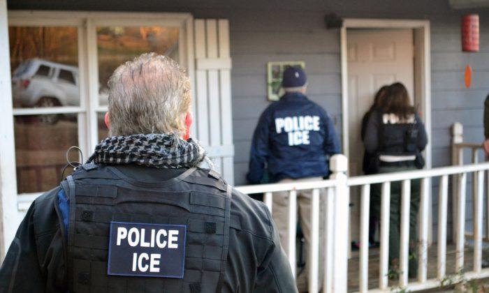 Immigration and Customs Enforcement agents seek to arrest immigration fugitives, re-entrants, and at-large criminal aliens during an operation in Atlanta, Ga., on Feb. 9, 2017. (Bryan Cox/U.S. Immigration and Customs Enforcement via Getty Images)
