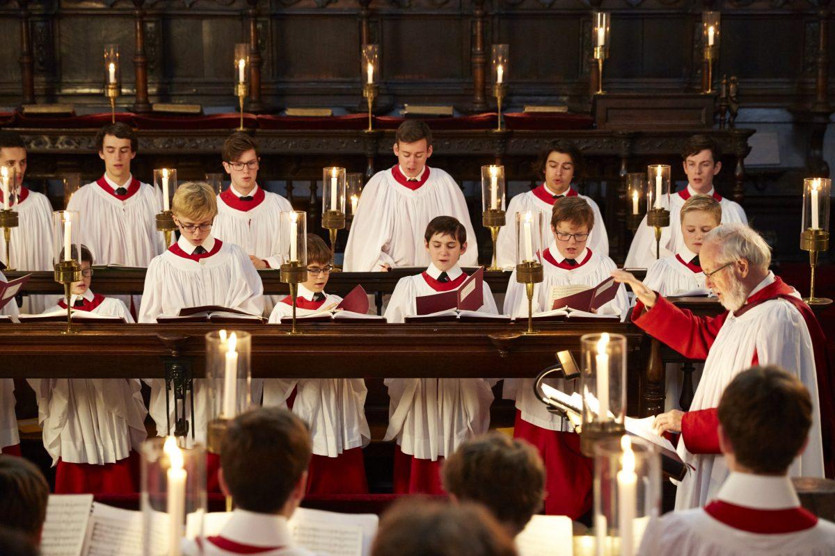 The 2018 choristers and choral scholars of The Choir of King's College, Cambridge sing by candlelight. (Kevin Leighton)