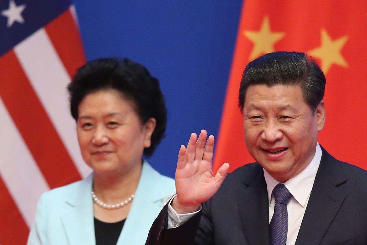 Chinese paramount leader Xi Jinping (R) and Vice Premier Liu Yandong (L) arrive at the opening ceremony of the 6th China-U.S. Security and Economic Dialogue and 5th round of China-U.S. High Level Consultation on People-to-People Exchange at Diaoyutai State Guest House on July 9, 2014 in Beijing, China. (Feng Li/Getty Images)