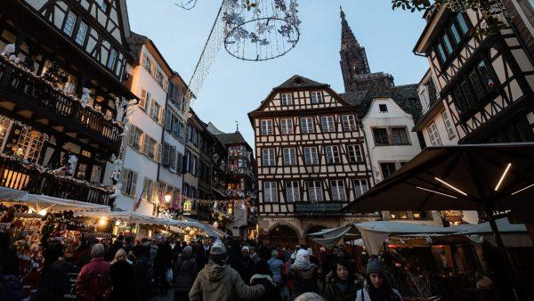 People once again in the streets as Strasbourg's Christmas market reopens under the protection of police, in Strasbourg, France, on Dec. 15, 2018. (Jean-Francois Badias/AP)