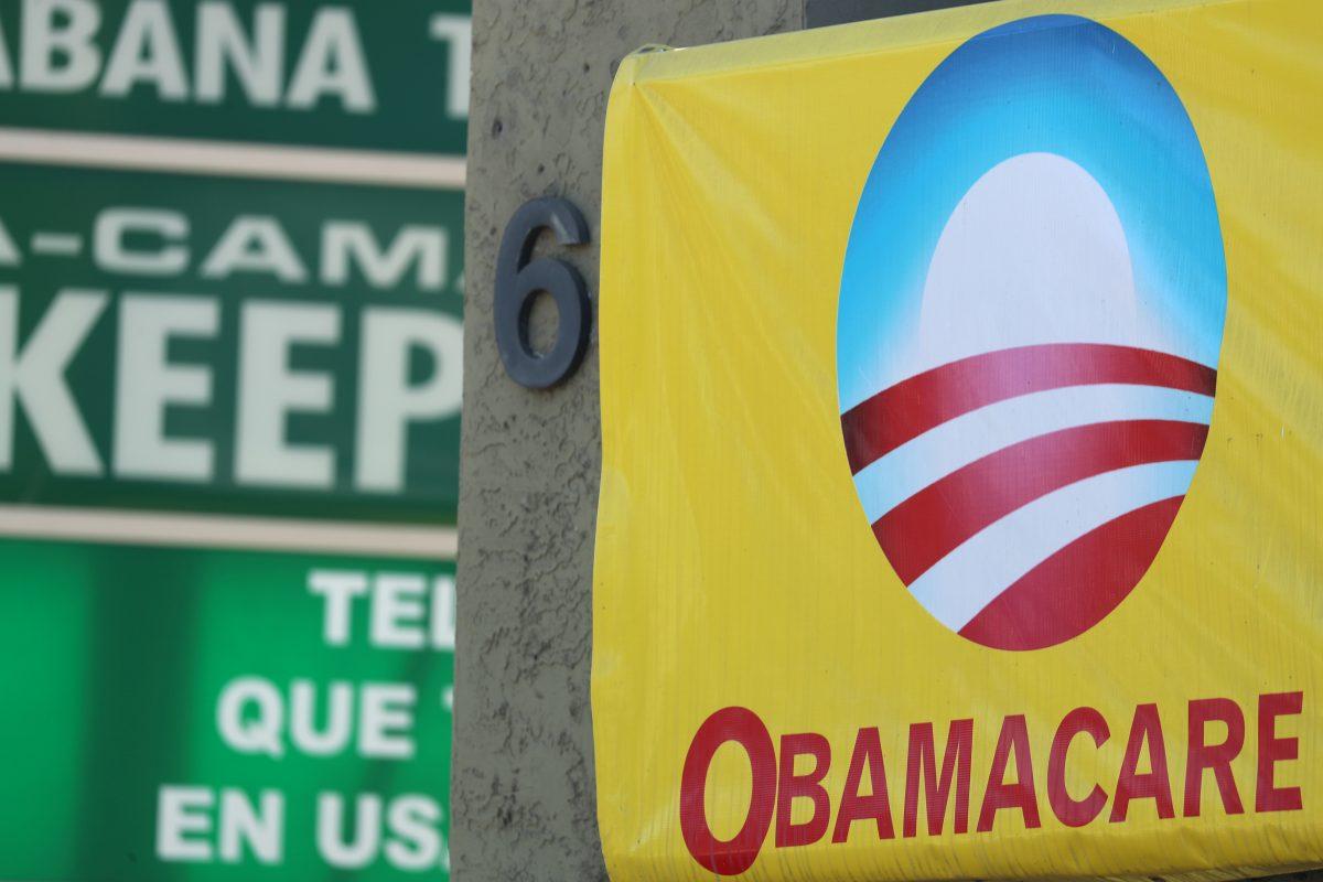 A sign on an insurance store advertises Obamacare in San Ysidro, San Diego, California, U.S., Oct. 26, 2017. (Mike Blake/Reuters)