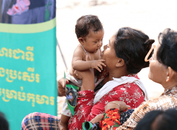 An unidentified woman holding a baby. (Cambodian Children’s Trust)